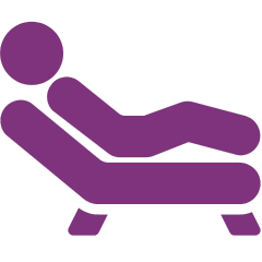 Icono de una persona tumbada en el sofá de una consulta de terapia, simbolizando el proceso terapéutico.